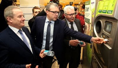  Image of former Environment Minister using reverse vending machine